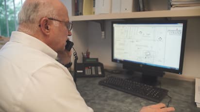 Tom at computer still image from 215 2016 PA College Forum Master.JPG